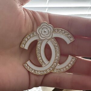 Elegant Gold and White Crystal Brooch